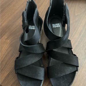 Eileen Fisher criss cross open toe black suede/leather platforms.